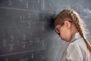 girl bangs her head against the blackboard. Just doesnt get it.
